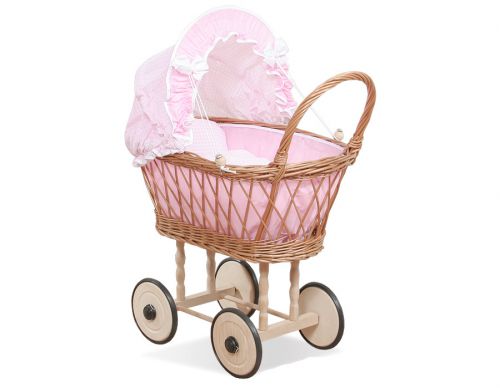 Puppenwagen aus Korbgeflecht mit rosa Bettzeug und Polsterung - natur